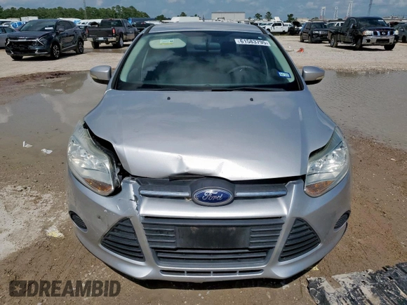 2013 Ford Focus SE with VIN 1FADP3F22DL263124, listed as a Copart auction lot 61583795 with 133,522 mi miles and Salvage title. Bid and sale history available at DreamBid. Image 5.