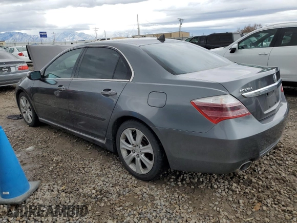 2009 Acura RL Tech Pkg with VIN JH4KB26609C002111, listed as a Copart auction lot 84668184 with 149,870 mi miles and Salvage Title. Bid and sale history available at carsss.com. Image 2.