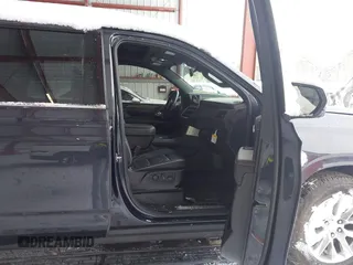 2023 Chevrolet Tahoe Premier with VIN 1GNSKSKL6PR545302, listed as a IAAI auction lot 41017179 with 16,877 mi miles and . Bid and sale history available at DreamBid. Image 5.