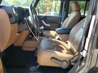 2016 Jeep Wrangler Unlimited Sahara z VIN 1C4BJWEG3GL115814, wystawiony jako Copart lot #62281895 z przebiegiem 75 039 mil mil oraz Szkoda całkowita • Salvage title. Historia ofert i sprzedaży dostępna na DreamBid. Obrazek 7.