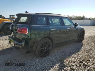 2019 MINI Clubman Cooper with VIN WMWLU1C59K2F29677, listed as a Copart auction lot 77201334 with 57,012 mi miles and Salvage Title. Bid and sale history available at carsss.com. Image 3.