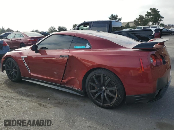 2015 Nissan GT-R Premium z VIN JN1AR5EF9FM280350, wystawiony jako Copart lot #58313634 z przebiegiem 83 387 mil mil oraz Szkody całkowita. Historia ofert i sprzedaży dostępna na DreamBid. Obrazek 2.