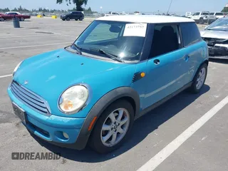 2007 MINI Hardtop with VIN WMWMF335X7TT54929, listed as a IAAI auction lot 42173757 with 71,496 mi miles and . Bid and sale history available at DreamBid. Image 18.