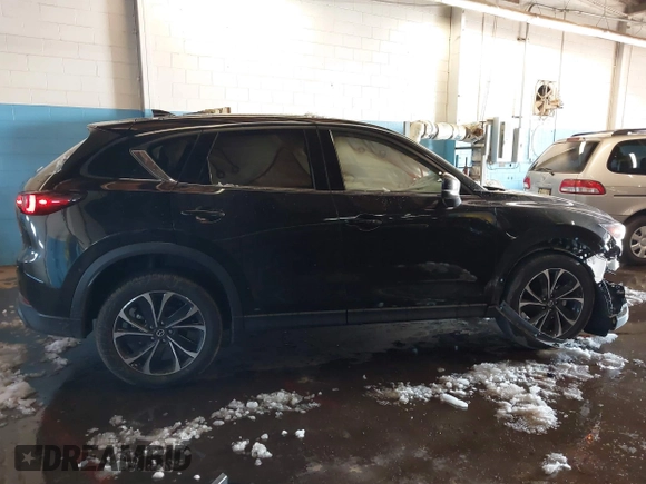2023 Mazda CX-5 S Premium with VIN JM3KFBDM6P0100301, listed as a IAAI auction lot 41548310 with 21,722 mi miles and . Bid and sale history available at carsss.com. Image 13.