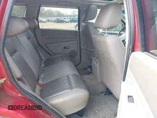 2005 Jeep Grand Cherokee Laredo with VIN 1J4HS48N95C711992, listed as a IAAI auction lot 41944696 with 209,299 mi miles and . Bid and sale history available at DreamBid. Image 8.