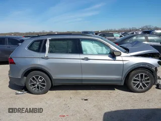 2021 Volkswagen Tiguan SE with VIN 3VV3B7AXXMM116774, listed as a IAAI auction lot 41868796 with Not Provided miles and . Bid and sale history available at DreamBid. Image 12.