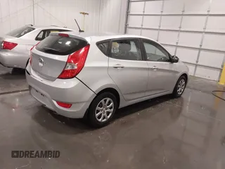 2014 Hyundai Accent GS with VIN KMHCT5AE4EU150877, listed as a IAAI auction lot 41989235 with 68,918 mi miles. Bid and sale history available at carsss.com. Image 4.