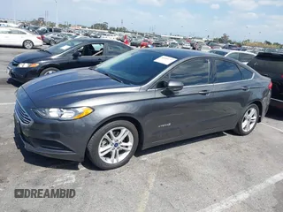 2018 Ford Fusion Hybrid SE with VIN 3FA6P0LU4JR261594, listed as a IAAI auction lot 40360797 with 128,533 mi miles. Bid and sale history available at carsss.com. Image 2.