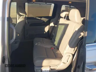 2014 Honda Odyssey Touring with VIN 5FNRL5H97EB094353, listed as a IAAI auction lot 41701712 with 141,228 mi miles and . Bid and sale history available at DreamBid. Image 8.