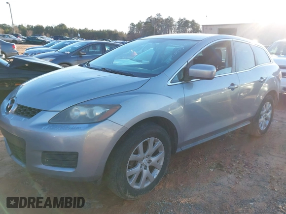 2009 Mazda CX-7 Sport with VIN JM3ER293290221298, listed as a IAAI auction lot 41067088 with 230,241 mi miles. Bid and sale history available at carsss.com. Image 2.