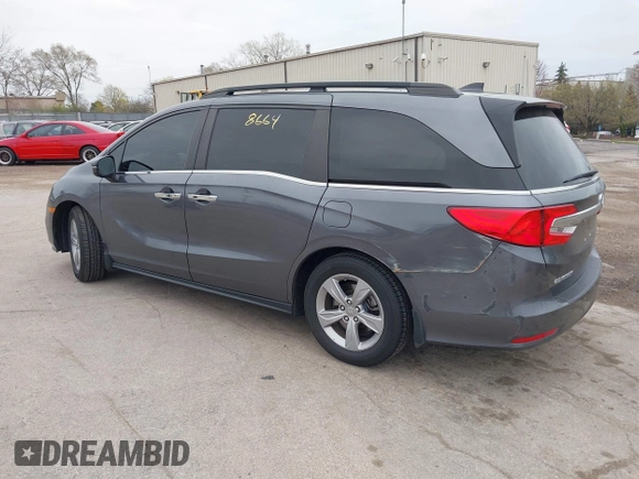 2018 Honda Odyssey EX-L with VIN 5FNRL6H72JB076597, listed as a IAAI auction lot 41838664 with 154,647 mi miles and . Bid and sale history available at DreamBid. Image 3.