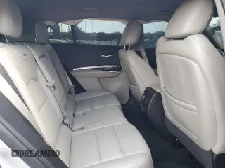 2019 Cadillac XT4 FWD Luxury z VIN 1GYAZAR42KF119510, wystawiony jako Copart lot #48979395 z przebiegiem 57 498 mil mil oraz Szkoda całkowita • Salvage title. Historia ofert i sprzedaży dostępna na DreamBid. Obrazek 11.
