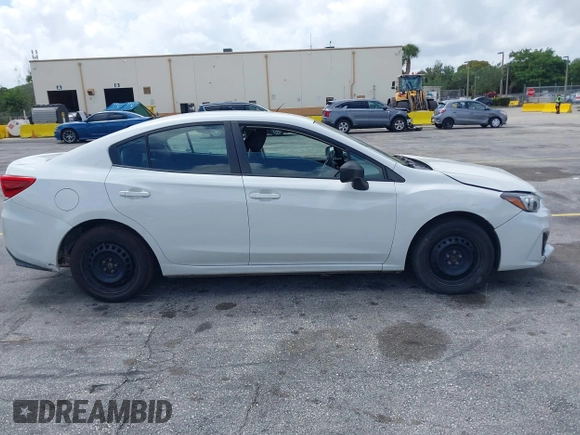 2018 Subaru Impreza with VIN 4S3GKAA68J3609404, listed as a IAAI auction lot 41954733 with 214,560 mi miles and . Bid and sale history available at DreamBid. Image 13.