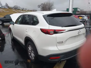 2016 Mazda CX-9 Sport with VIN JM3TCABY4G0123931, listed as a IAAI auction lot 41710045 with 161,109 mi miles. Bid and sale history available at carsss.com. Image 3.