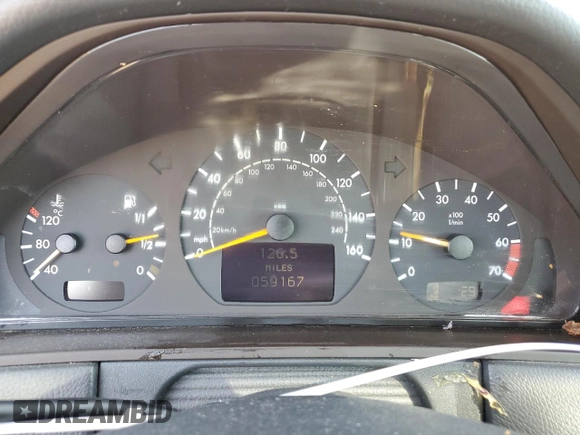 2002 Mercedes-Benz E-Class with VIN WDBJF70J22B489706, listed as a Copart auction lot 71109874 with 59,167 mi miles and Salvage Title. Bid and sale history available at carsss.com. Image 9.