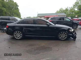 2014 Audi A4 Premium z VIN WAUBFAFL7EN018419, wystawiony jako IAAI lot #42350651 z przebiegiem 128 809 mil mil oraz . Historia ofert i sprzedaży dostępna na DreamBid. Obrazek 14.