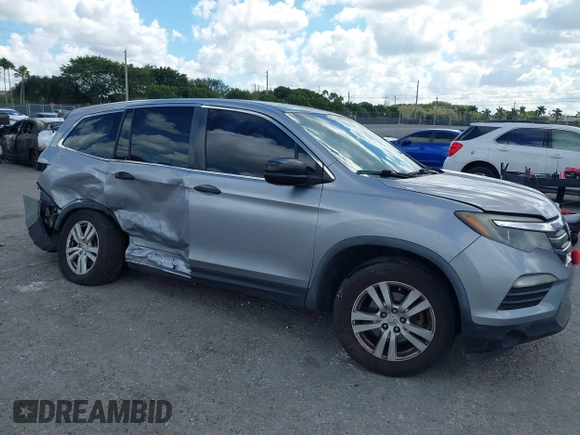 2016 Honda Pilot LX with VIN 5FNYF6H1XGB099987, listed as a IAAI auction lot 41556979 with 98,373 mi miles. Bid and sale history available at carsss.com. Image 1.