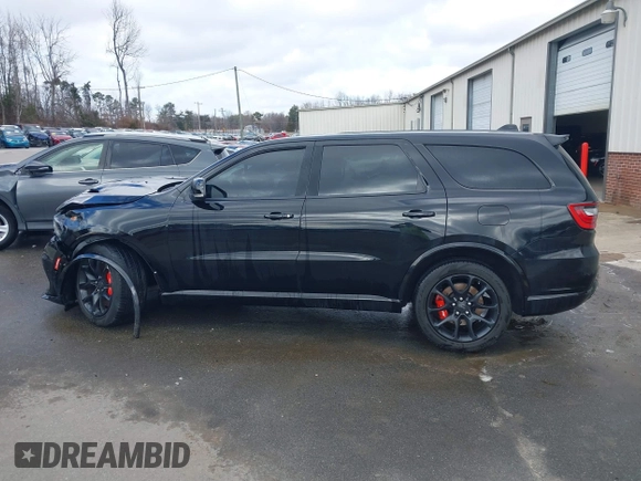 2023 Dodge Durango SRT Hellcat Premium with VIN 1C4SDJH90PC557375, listed as a IAAI auction lot 41328850 with 30,697 mi miles and . Bid and sale history available at DreamBid. Image 13.