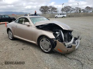 2002 Lexus SC 430 with VIN JTHFN48Y320010682, listed as a Copart auction lot 60476285 with 198,630 mi miles and Salvage title. Bid and sale history available at DreamBid. Image 4.