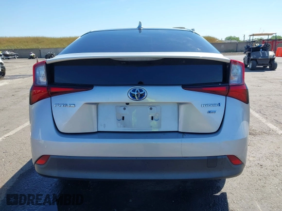 2021 Toyota Prius L Eco with VIN JTDKAMFUXM3144991, listed as a IAAI auction lot 42147025 with 106,466 mi miles and . Bid and sale history available at DreamBid. Image 15.