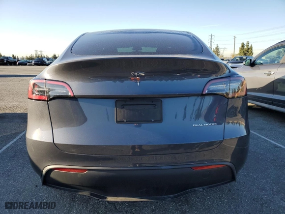 2022 Tesla Model Y Long Range with VIN 7SAYGDEE5NA022384, listed as a Copart auction lot 49283345 with 31,925 mi miles and Salvage Title. Bid and sale history available at carsss.com. Image 6.
