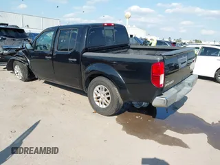 2014 Nissan Frontier SV with VIN 1N6AD0ER5EN745740, listed as a IAAI auction lot 41864104 with 161,303 mi miles and . Bid and sale history available at DreamBid. Image 3.