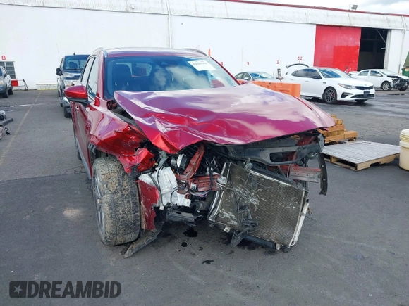 2020 Mazda CX-9 Grand Touring with VIN JM3TCBDY4L0423563, listed as a IAAI auction lot 41829394 with 76,704 mi miles and . Bid and sale history available at DreamBid. Image 6.