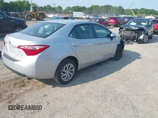2018 Toyota Corolla L with VIN 2T1BURHE6JC100175, listed as a IAAI auction lot 42405737 with 123,183 mi miles and . Bid and sale history available at DreamBid. Image 4.