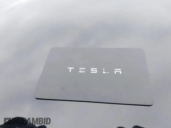 2023 Tesla Model 3 Long Range with VIN 5YJ3E1EBXPF708122, listed as a IAAI auction lot 41185314 with 27,765 mi miles and . Bid and sale history available at DreamBid. Image 11.