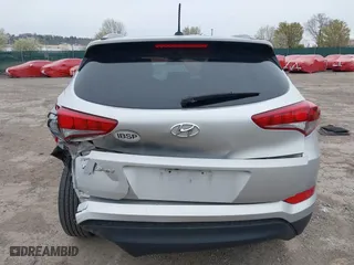 2016 Hyundai Tucson SE with VIN KM8J33A44GU187515, listed as a IAAI auction lot 42015707 with 89,948 mi miles. Bid and sale history available at carsss.com. Image 16.