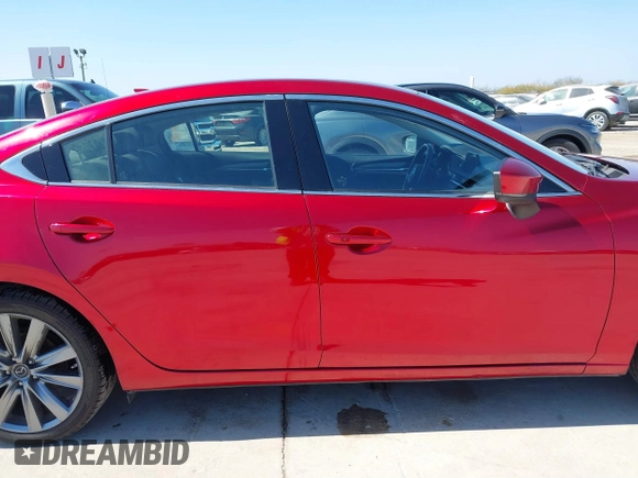 2020 Mazda 6 Grand Touring with VIN JM1GL1TY7L1511054, listed as a IAAI auction lot 41734848 with 70,573 mi miles and . Bid and sale history available at carsss.com. Image 13.