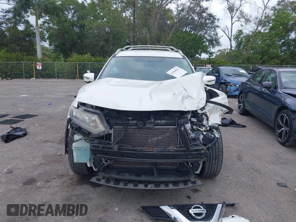 2016 Nissan Rogue S with VIN KNMAT2MTXGP674248, listed as a IAAI auction lot 41204924 with 68,023 mi miles and . Bid and sale history available at DreamBid. Image 6.