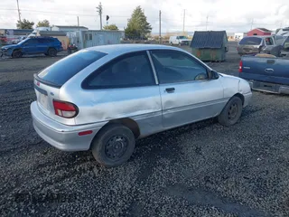 1994 Ford Aspire with VIN KNJLT05H6R6138507, listed as a IAAI auction lot 41789132 with 119,575 mi miles and . Bid and sale history available at DreamBid. Image 4.