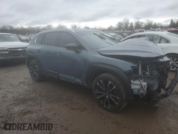 2023 Mazda CX-50 S Premium Plus with VIN 7MMVABEM3PN101329, listed as a Copart auction lot 85211514 with 44,245 mi miles and Salvage Title. Bid and sale history available at DreamBid. Image 4.