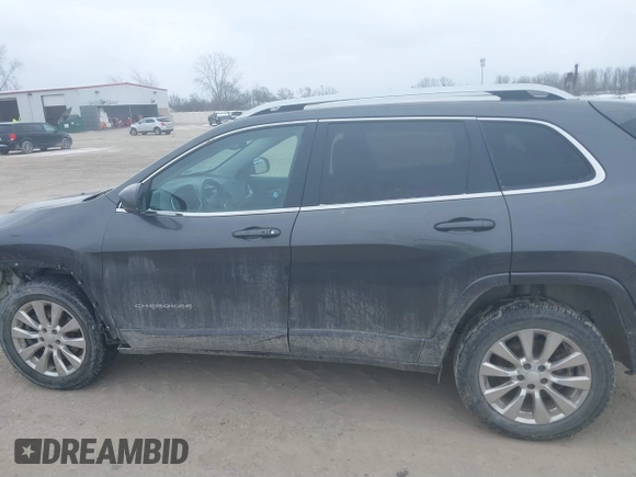 2018 Jeep Cherokee Overland with VIN 1C4PJMJX5JD594240, listed as a IAAI auction lot 41285832 with 130,334 mi miles. Bid and sale history available at carsss.com. Image 14.