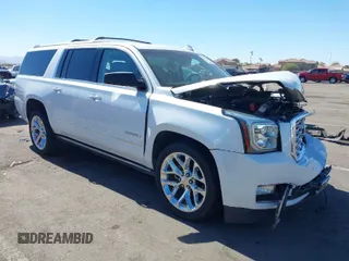 2018 GMC Yukon XL Denali with VIN 1GKS2HKJ2JR183877, listed as a IAAI auction lot 41652039 with 123,075 mi miles. Bid and sale history available at carsss.com. Image 1.
