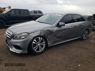 2014 Mercedes-Benz E 350 Sport with VIN WDDHF5KB2EA854735, listed as a Copart auction lot 88583415 with 99,456 mi miles and Salvage title. Bid and sale history available at DreamBid. Image 1.
