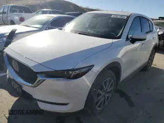 2018 Mazda CX-5 Grand Touring with VIN JM3KFADM3J1410210, listed as a Copart auction lot 44031365 with 69,016 mi miles and Clean Title. Bid and sale history available at DreamBid. Image 1.