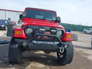 2004 Jeep Wrangler Sport with VIN 1J4FA49S54P744171, listed as a IAAI auction lot 41974657 with 173,230 mi miles. Bid and sale history available at carsss.com. Image 12.
