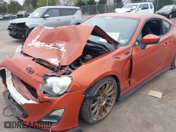 2014 Scion FR-S z VIN JF1ZNAA16E9703911, wystawiony jako IAAI lot #42079578 z przebiegiem 95 754 mil mil oraz . Historia ofert i sprzedaży dostępna na DreamBid. Obrazek 6.