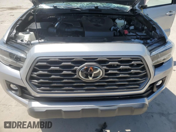 2021 Toyota Tacoma SR с VIN 3TMCZ5AN1MM440032, выставлен на аукционе Copart как лот 56972895 с пробегом 41 029 миль миль и Списание • Salvage title. История ставок и продаж доступна на DreamBid. Изображение 11.
