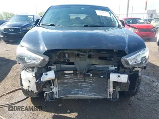 2017 Mitsubishi Outlander ES z VIN JA4AP3AU4HZ007103, wystawiony jako IAAI lot #42129563 z przebiegiem 113 554 mil mil oraz . Historia ofert i sprzedaży dostępna na DreamBid. Obrazek 13.