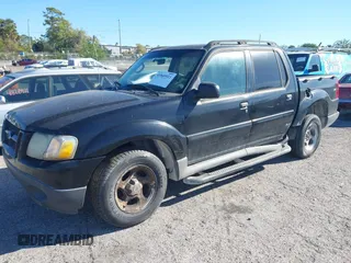 2004 Ford Explorer Sport Trac XLS z VIN 1FMZU67K04UB59407, wystawiony jako IAAI lot #41849511 z przebiegiem 235 858 mil mil oraz . Historia ofert i sprzedaży dostępna na DreamBid. Obrazek 2.