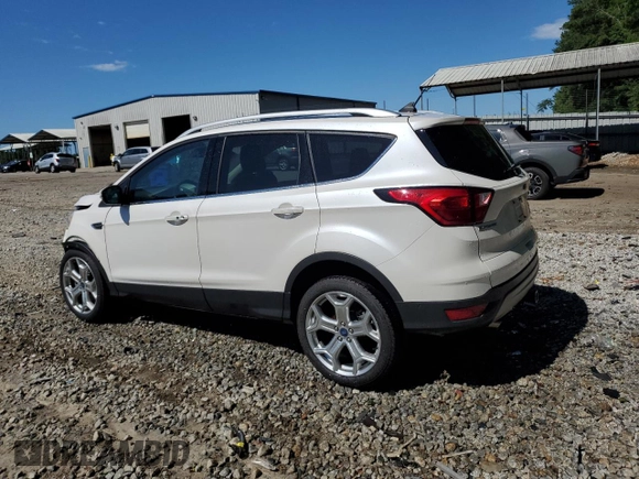 2019 Ford Escape Titanium with VIN 1FMCU9J97KUA21390, listed as a Copart auction lot 57640175 with 51,254 mi miles and Salvage title. Bid and sale history available at DreamBid. Image 2.