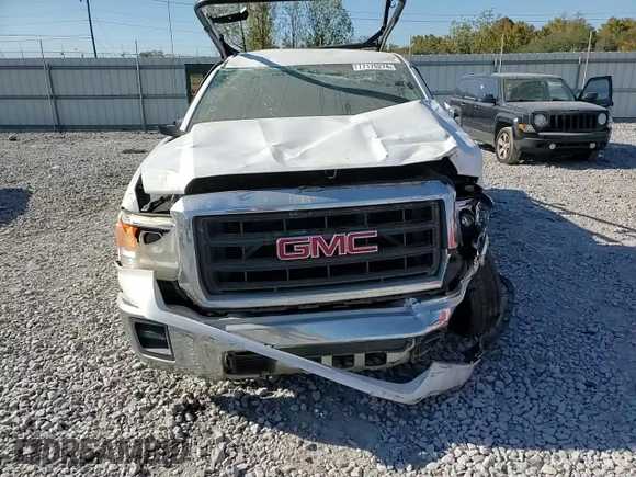 2014 GMC Sierra 1500 z VIN 1GTN1TEH4EZ257670, wystawiony jako Copart lot #77175274 z przebiegiem 266 997 mil mil oraz Szkody całkowita. Historia ofert i sprzedaży dostępna na DreamBid. Obrazek 11.