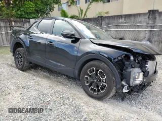 2023 Hyundai Santa Cruz SEL z VIN 5NTJB4AE4PH057705, wystawiony jako Copart lot #80667054 z przebiegiem 14 580 mil mil oraz Nie do naprawy • Non repairable. Historia ofert i sprzedaży dostępna na DreamBid. Obrazek 4.
