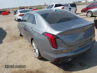 2022 Cadillac CT4 Premium Luxury z VIN 1G6DB5RK6N0118383, wystawiony jako IAAI lot #42042326 z przebiegiem 56 310 mil mil oraz . Historia ofert i sprzedaży dostępna na DreamBid. Obrazek 3.