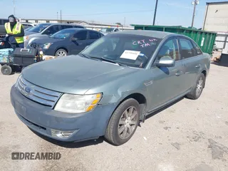 2008 Ford Taurus SEL with VIN 1FAHP27W38G109131, listed as a IAAI auction lot 41739444 with 147,848 mi miles. Bid and sale history available at carsss.com. Image 2.