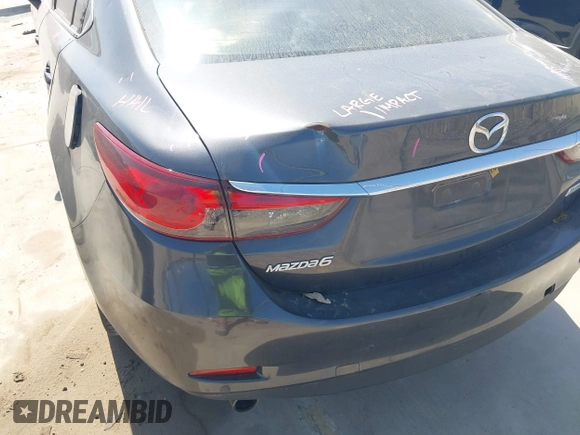 2014 Mazda 6 i Touring with VIN JM1GJ1V55E1105379, listed as a IAAI auction lot 42010585 with 153,870 mi miles and . Bid and sale history available at DreamBid. Image 18.