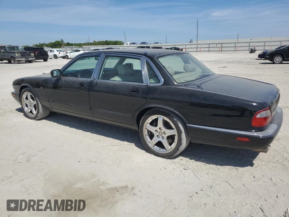 2003 Jaguar XJ with VIN SAJDA15B83MF58887, listed as a Copart auction lot 51057895 with 189,770 mi miles and Clean title. Bid and sale history available at DreamBid. Image 2.